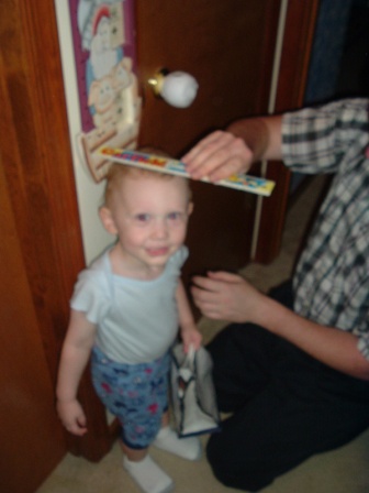 Brian having height measured