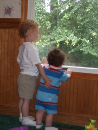 brian and alex looking out the window