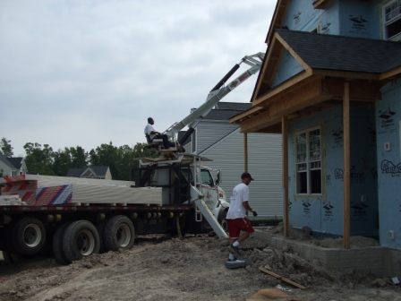 Drywall being brought in